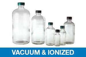 Qorpak Vacuum / Ionized Clear Glass Boston Round Bottles with Caps - Vacuum and Ionized Boston Round Bottle with PolyCone-Lined Cap, Clear, 4 oz. - GLC-01133